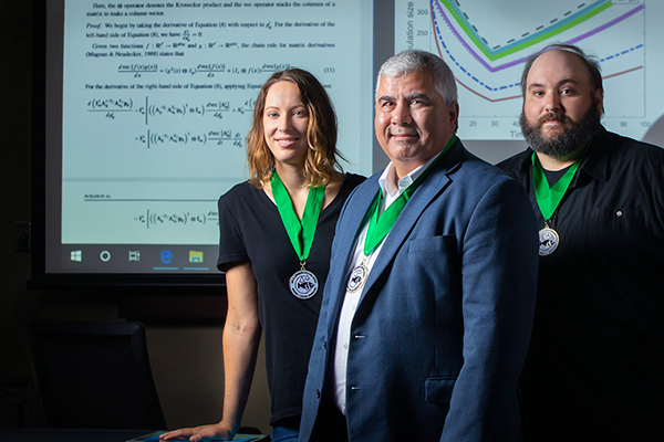 Recipients of the Rollie Lamberson Research Award wearing green-ribboned medallions.