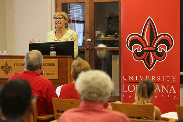 Dr. Natalia Sidorovskaia speaks to assembly in Broussard Hall. 