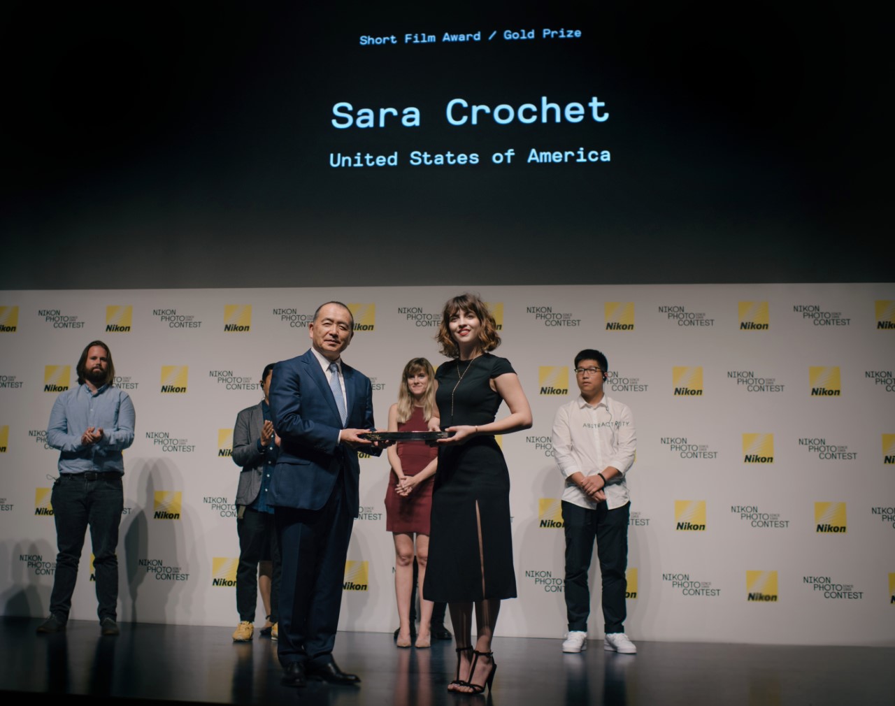Sara Crochet accepts award in the 2019 Nikon Photo Contest