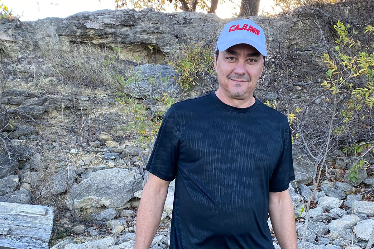 University of Louisiana at Lafayette geology graduate Tim Dore on a rock formation