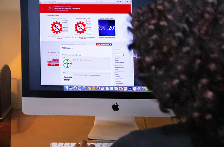 UL Lafayette student working on University's calendar