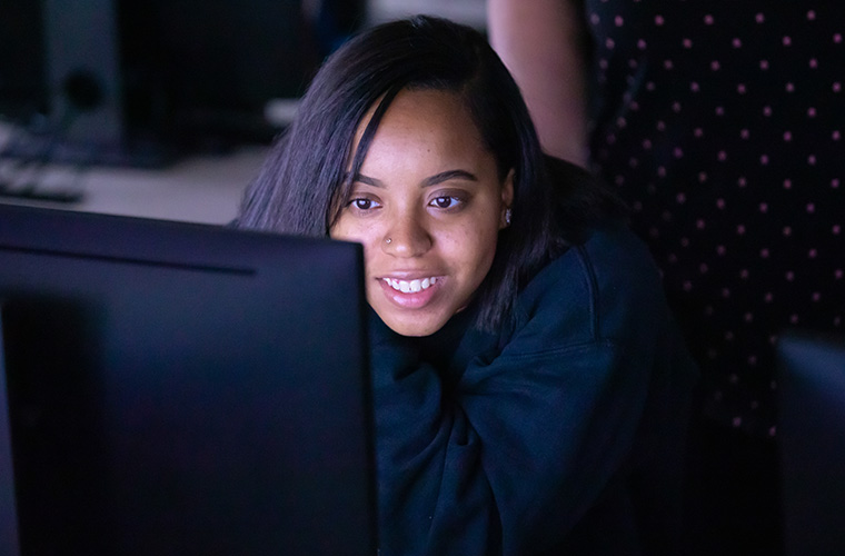 Student sitting at a computer