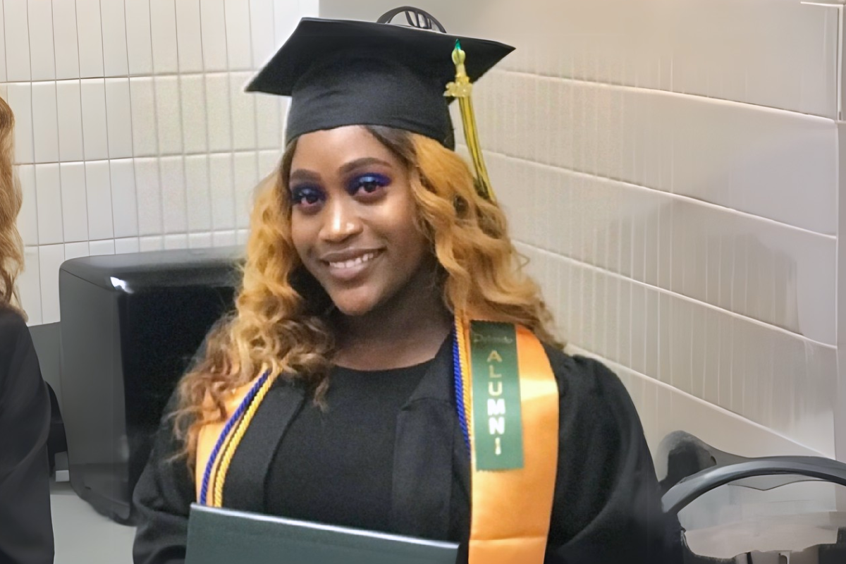 RN to BSN online graduate Tasmin George smiles for photo after earning her ADN.