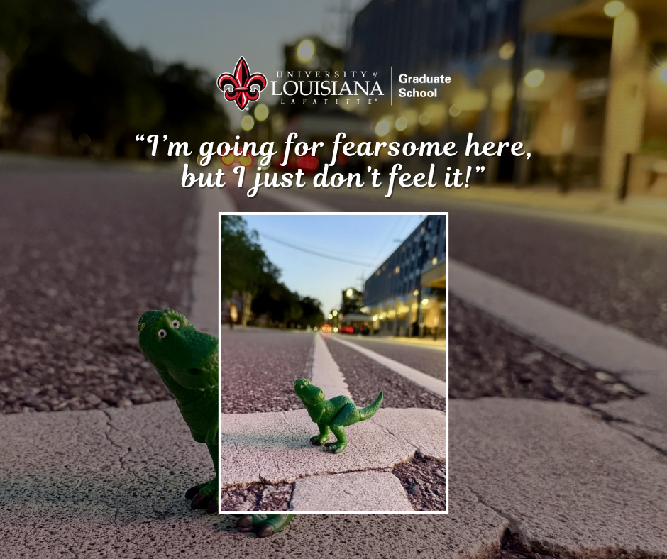 "I'm going for fearsome here, but I just don't feel it." A mini rex standing in the middle of rex street