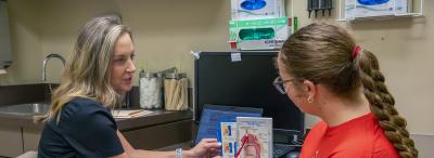 Nurse diagnosing student