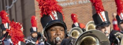 UL student plays trumpet in UL marching band